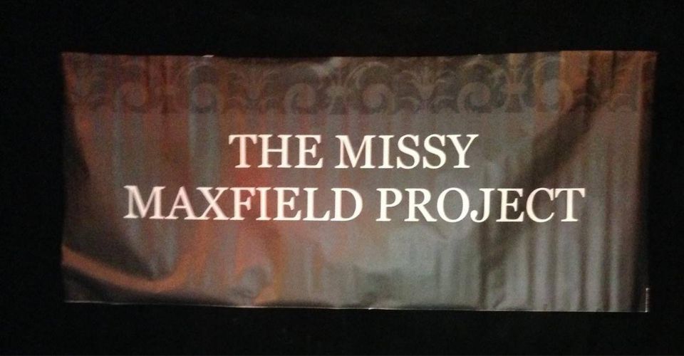 Sign reading The Missy Maxfield Project at SKYBOKX 109 Sports Bar & Grill in Natick, MA